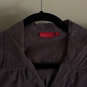 Button down, short sleeve shirt.